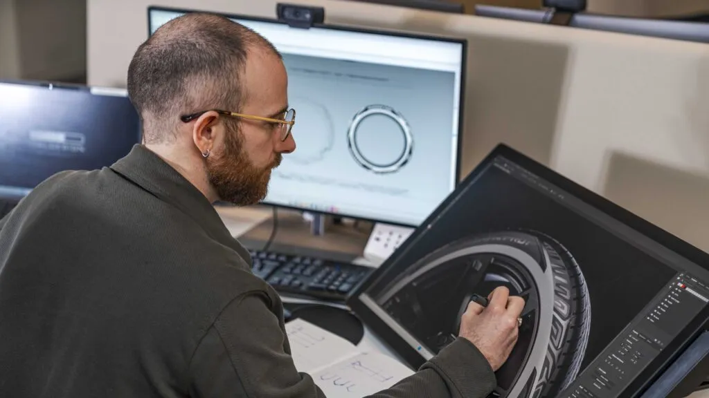 Close-up of Italdesign Passage sidewall artwork on Vredestein Quatrac Pro 2 evoking seasons and movement